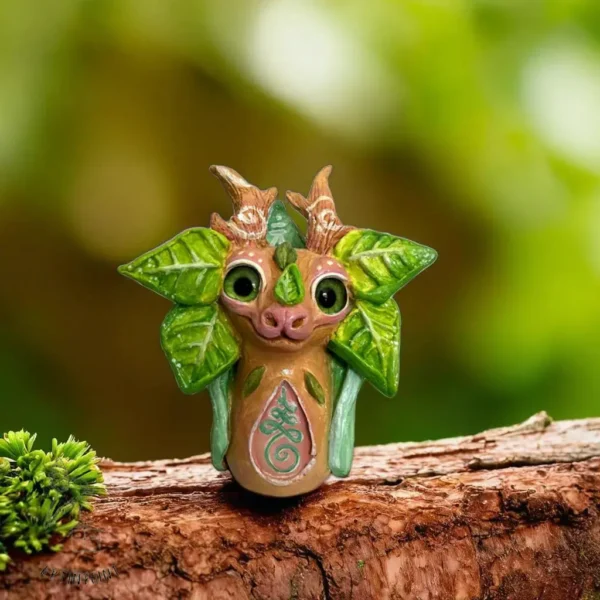 Totem of a forest Dragon, made with clay.